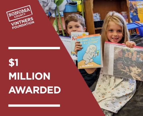 SCVF $1 Million Awarded with children showing books