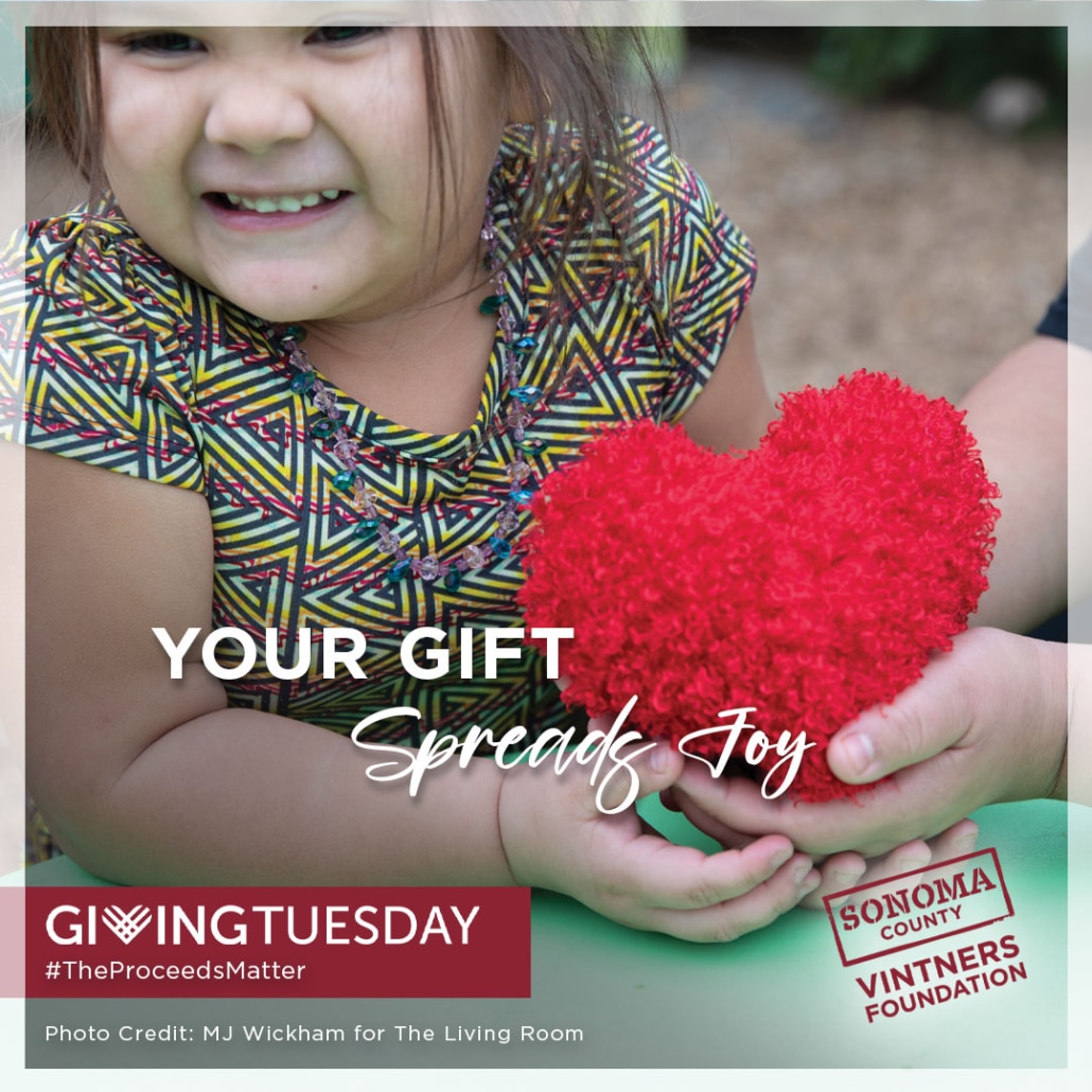 SCVF Giving Tuesday little girl holding a plush heart, Your Gift Spreads Joy