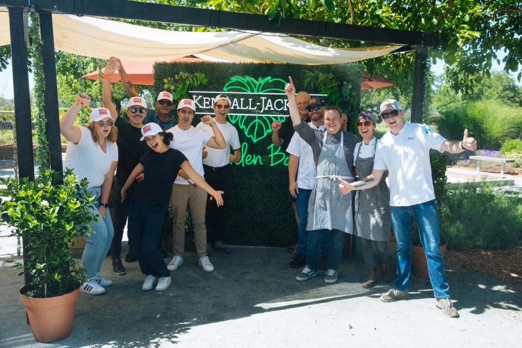 Taste of Sonoma volunteers in front of the KJ Garden bar
