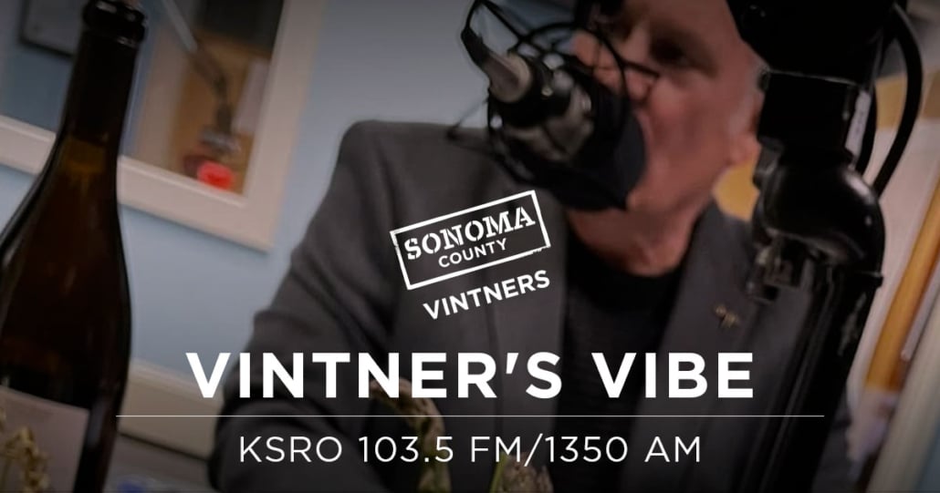 Sonoma County VIntners Vinter's Vibe KSRO 103.5 FM/1350 AM Mike Haney wearing headphones and speaking into a microphone in the radio studio