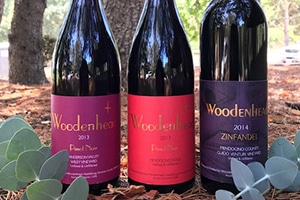 Three bottles of Woodenhead wine